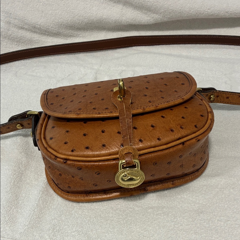 Dooney/Bourke tan ostrich embossed leather bag.